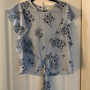 Blue and white flutter sleeve blouse